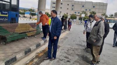 جهاز مدينة بدر ينظم حملات تطهير وتعقيم لموقف الأتوبيسات