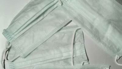 مقترح برلماني بتغريم بائعي الكمامات المغشوشة 4 آلاف جنيه